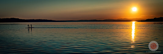 Paddleboarders at Sunrise